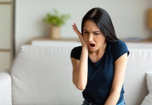 girl suffering from tooth pain